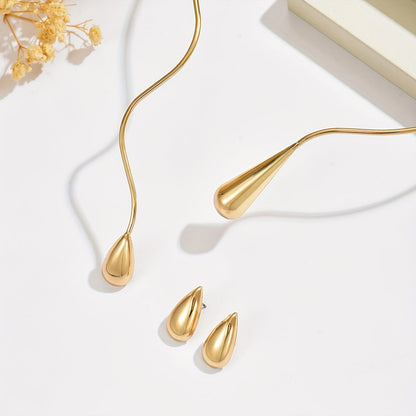 Taliah™ Elegant Necklace and Earring Set with Asymmetrical Drop Design