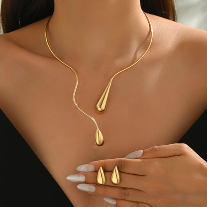 Taliah™ Elegant Necklace and Earring Set with Asymmetrical Drop Design