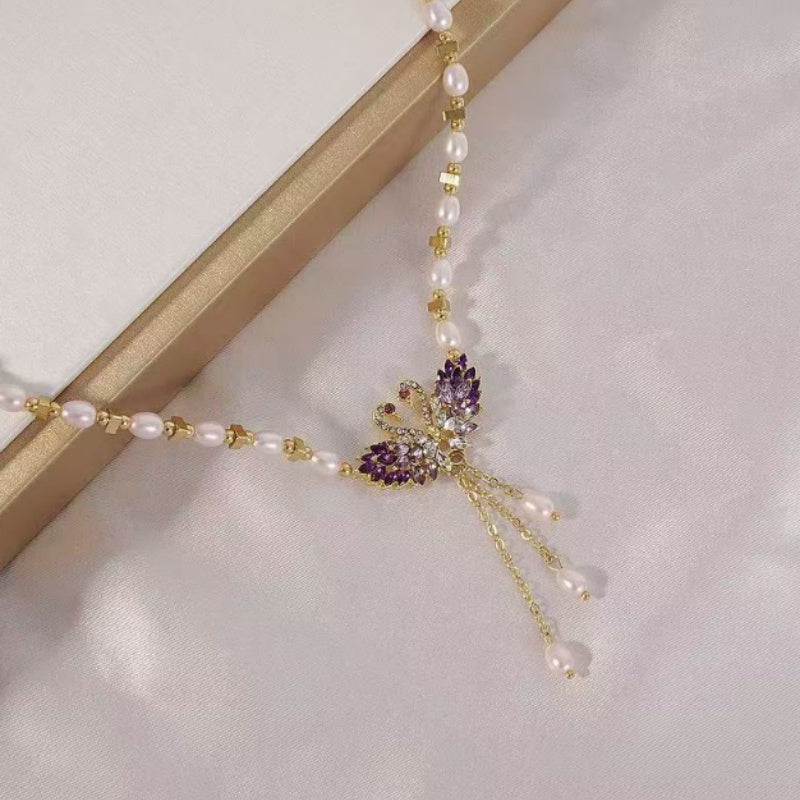 Winslow™ Double Swan Pendant Necklace in Purple